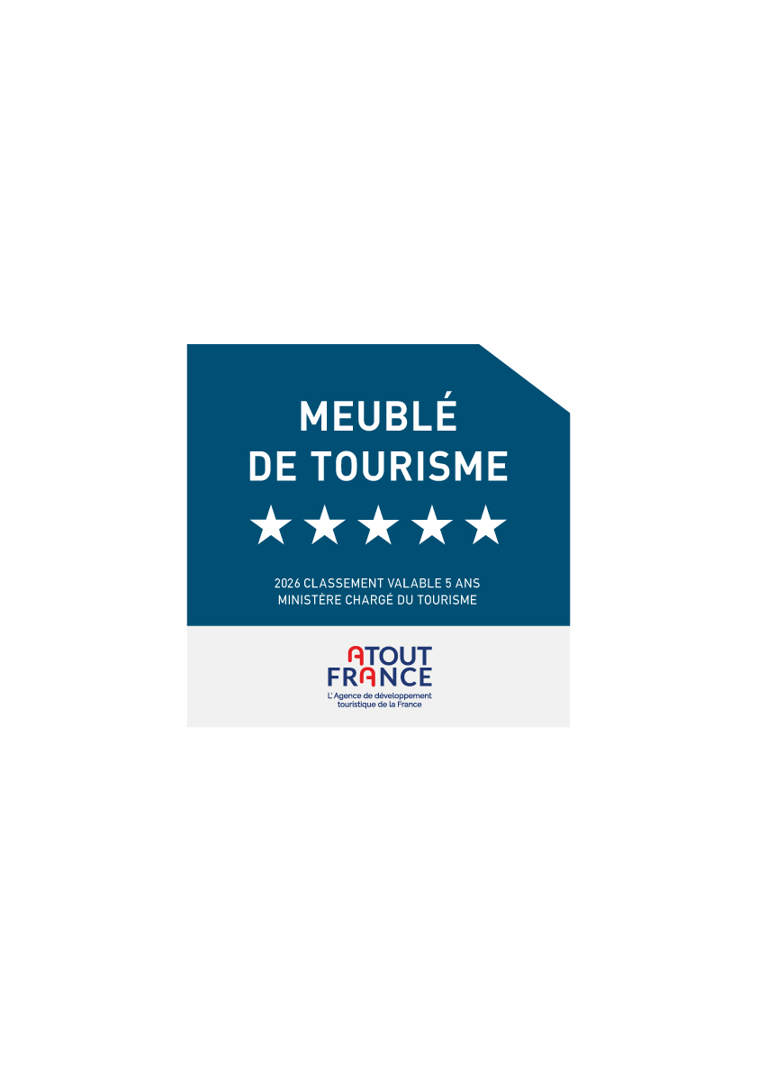 A blue and white sign displaying five stars and the text Meublé de Tourisme with a note below stating 2022 Classement valable 5 ans Ministère chargé du Tourisme and the Atout France logo at the bottom.